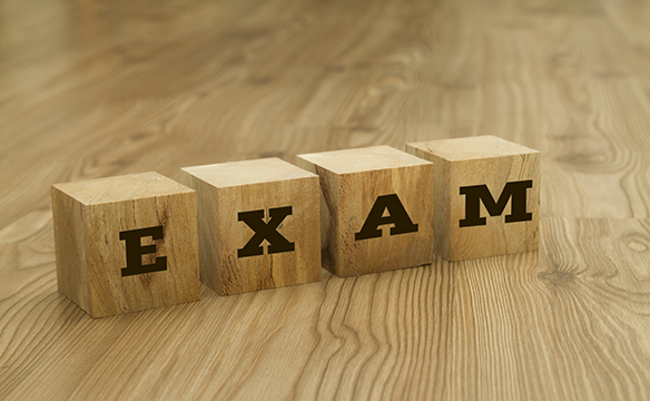 Exam written on blocks